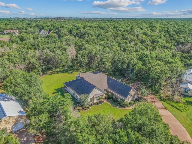 4662 Hidden Springs Way, College Station, TX 77845 - aerial view of property and surrounding area with a heavily wooded area