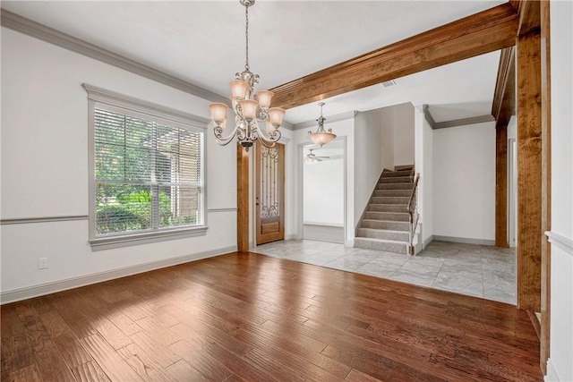 4662 Hidden Springs Way, College Station, TX 77845 - unfurnished room with a chandelier, ornamental molding, stairway, hardwood / wood-style floors, and baseboards