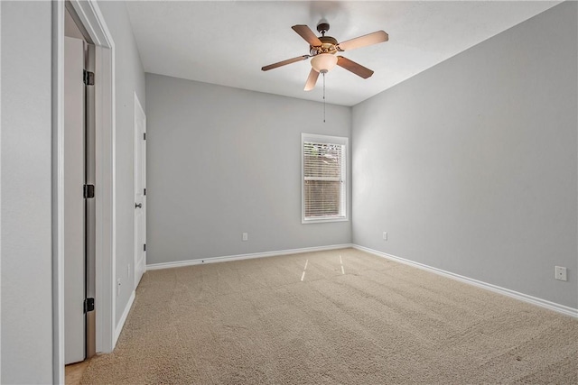 4662 Hidden Springs Way, College Station, TX 77845 - unfurnished bedroom with baseboards, light colored carpet, and a ceiling fan