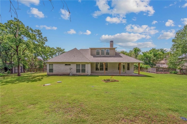 4662 Hidden Springs Way, College Station, TX 77845 - rear view of house featuring a chimney, covered porch, and an outdoor structure
