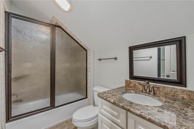 4662 Hidden Springs Way, College Station, TX 77845 - full bathroom with toilet, vanity, and enclosed tub / shower combo