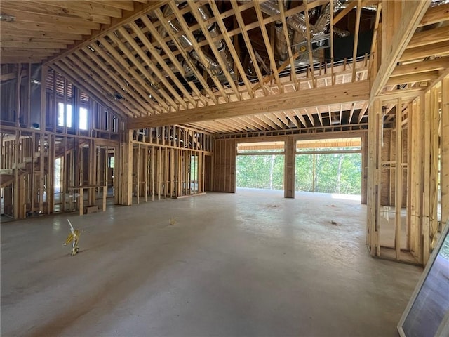 3719 Tatonga Trl, College Station, TX 77845 - misc room with plenty of natural light, lofted ceiling, and concrete flooring