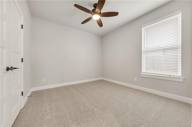 3013 Teller Dr, Bryan, TX 77808 - spare room featuring carpet floors, ceiling fan, and baseboards