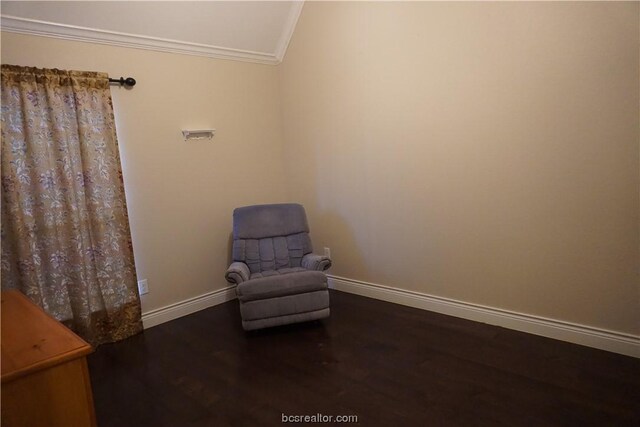 unfurnished room with hardwood / wood-style flooring, crown molding, and vaulted ceiling