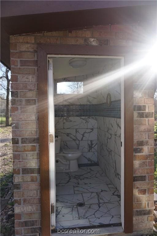 exterior space with toilet