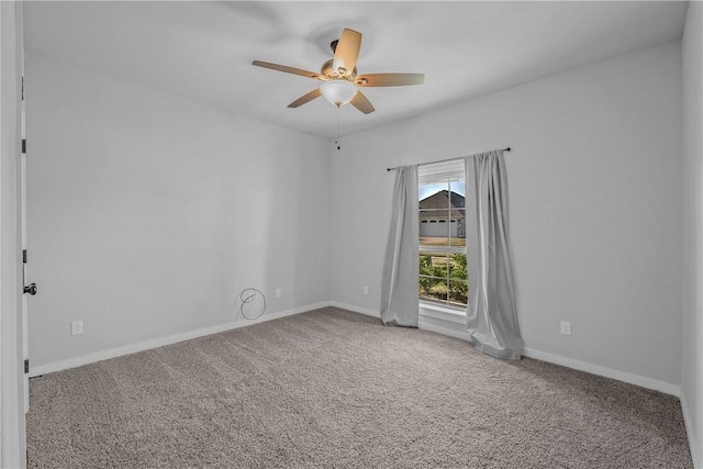 carpeted empty room with ceiling fan