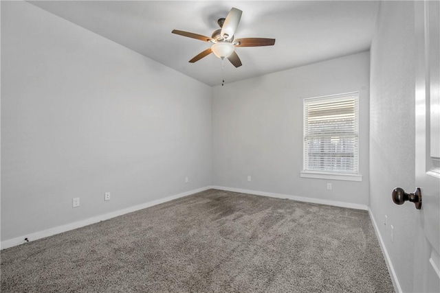 empty room featuring carpet and ceiling fan