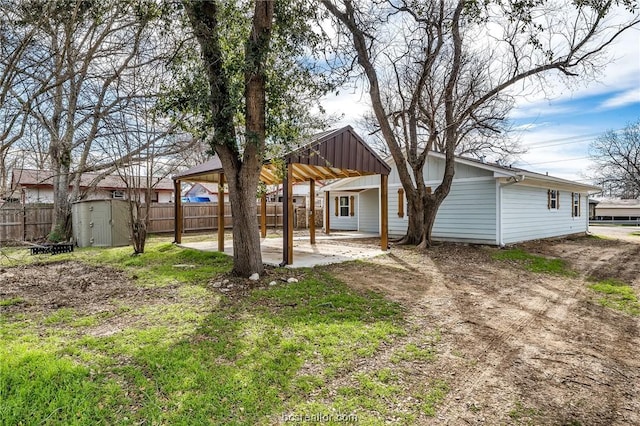 508 N O Neal St, Caldwell, TX 77836 - rear view of house with a storage shed
