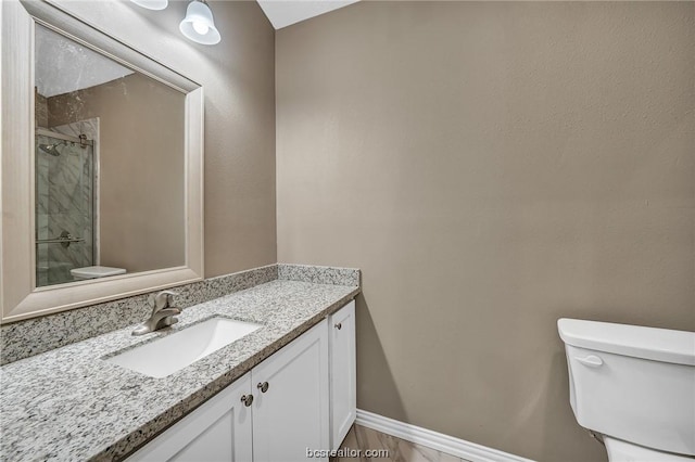 508 N O Neal St, Caldwell, TX 77836 - bathroom with tiled shower, vanity, and toilet