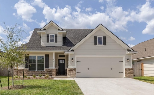 craftsman inspired home with a front yard