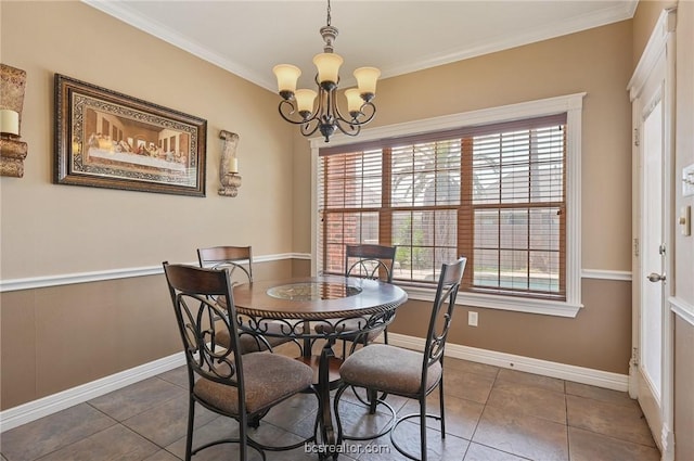 tiled dining space with a notable chandelier, a wealth of natural light, and ornamental molding