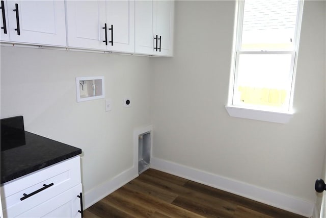 1977 Cambria Dr, Bryan, TX 77807 - laundry area featuring dark wood finished floors, electric dryer hookup, cabinet space, and hookup for a washing machine