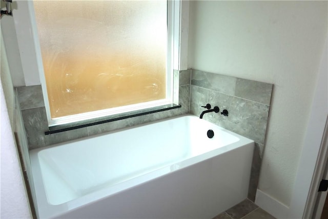 1977 Cambria Dr, Bryan, TX 77807 - bathroom featuring a garden tub