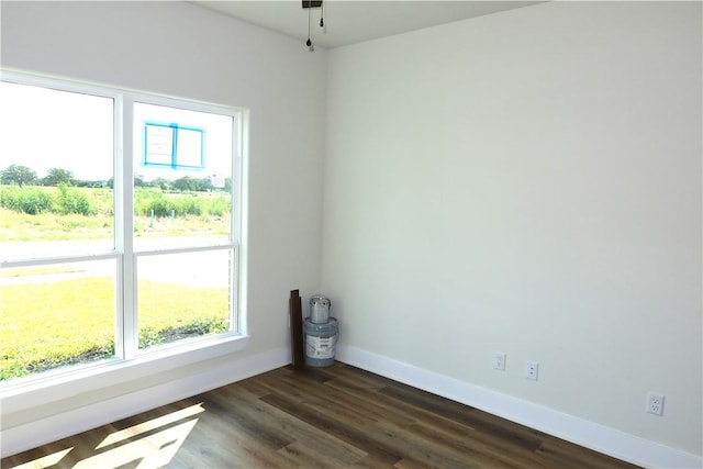 1977 Cambria Dr, Bryan, TX 77807 - unfurnished room with baseboards and dark wood finished floors