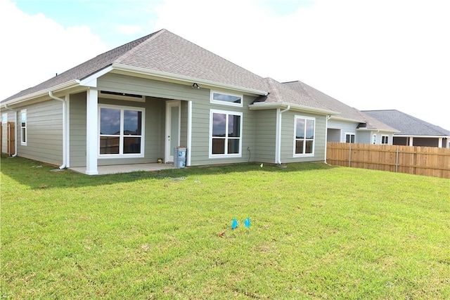 1977 Cambria Dr, Bryan, TX 77807 - rear view of house featuring a shingled roof