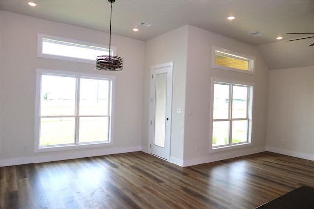 1977 Cambria Dr, Bryan, TX 77807 - unfurnished dining area featuring dark wood-type flooring, recessed lighting, and a chandelier