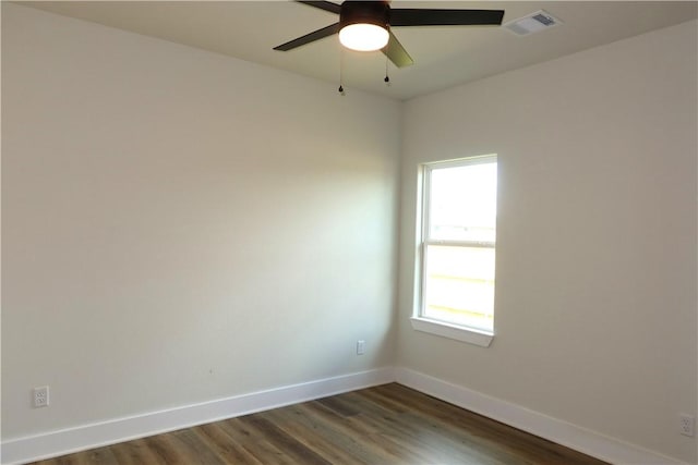 1977 Cambria Dr, Bryan, TX 77807 - empty room with ceiling fan and dark wood-style flooring
