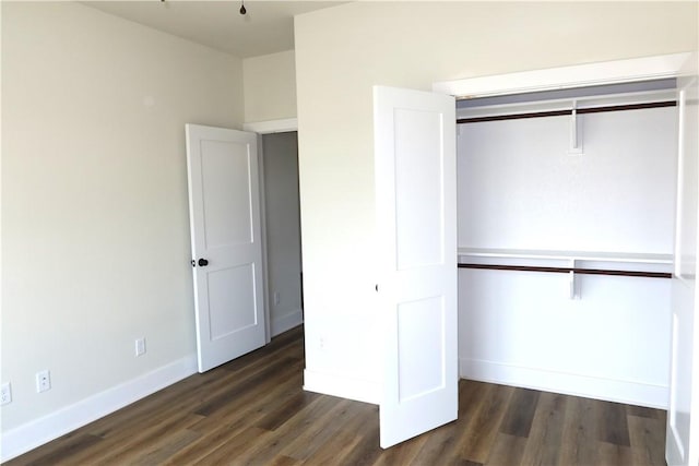 1977 Cambria Dr, Bryan, TX 77807 - unfurnished bedroom with wood finished floors and a closet