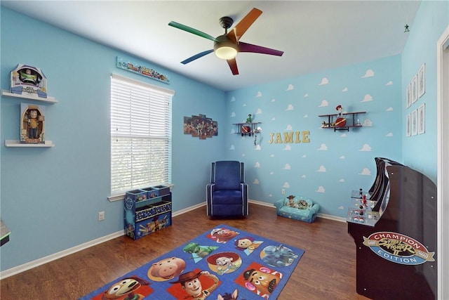 rec room featuring dark hardwood / wood-style floors and ceiling fan