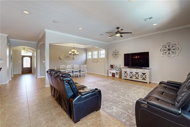 living room with ceiling fan with notable chandelier, light tile patterned floors, and ornamental molding