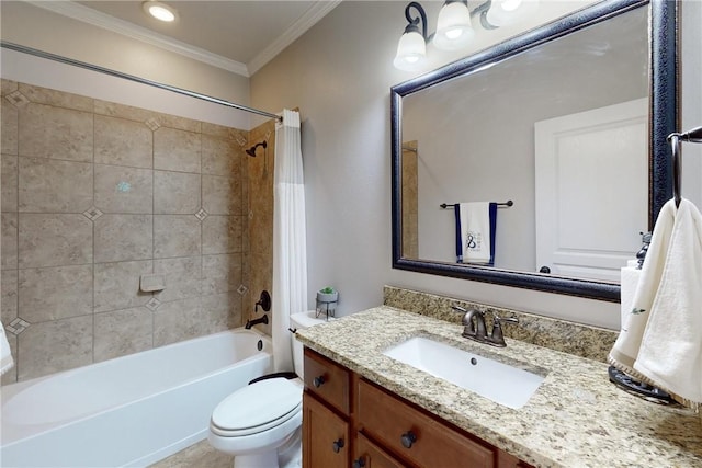 full bathroom with vanity, tiled shower / bath combo, toilet, and ornamental molding