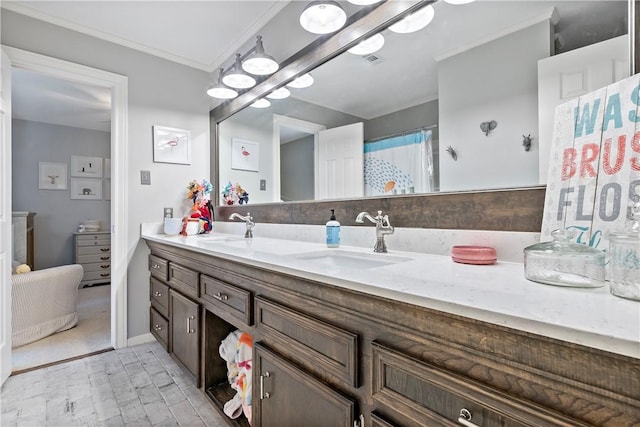 bathroom featuring vanity and crown molding