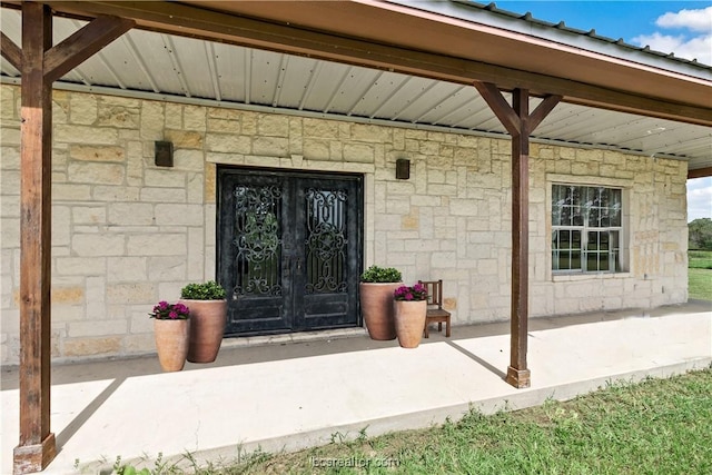 doorway to property with french doors