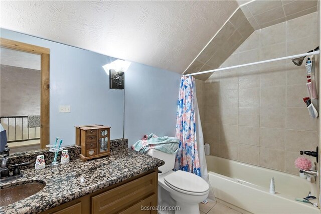 full bathroom with shower / bath combo, tile patterned flooring, a textured ceiling, toilet, and vanity