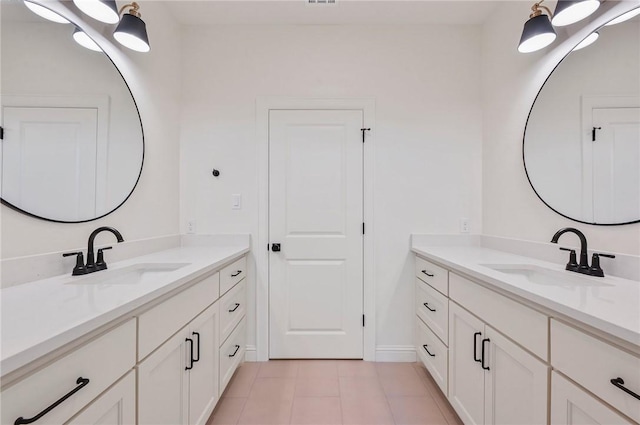 bathroom featuring vanity and tile patterned floors