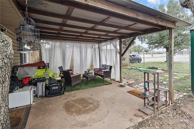 view of patio / terrace with fence and outdoor lounge area