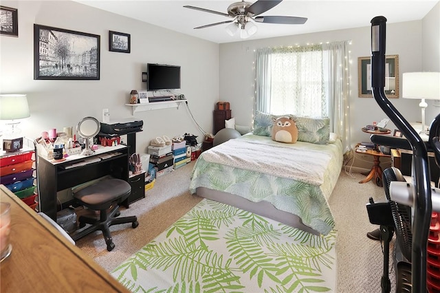 bedroom with ceiling fan and carpet