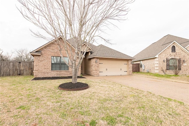 ranch-style home with brick siding, concrete driveway, fence, a garage, and a front lawn