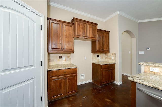 kitchen featuring light stone counters, arched walkways, concrete floors, and tasteful backsplash