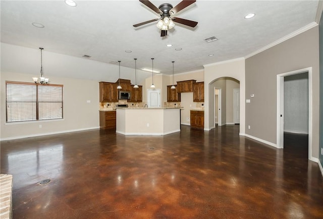 unfurnished living room with baseboards, concrete floors, visible vents, and arched walkways