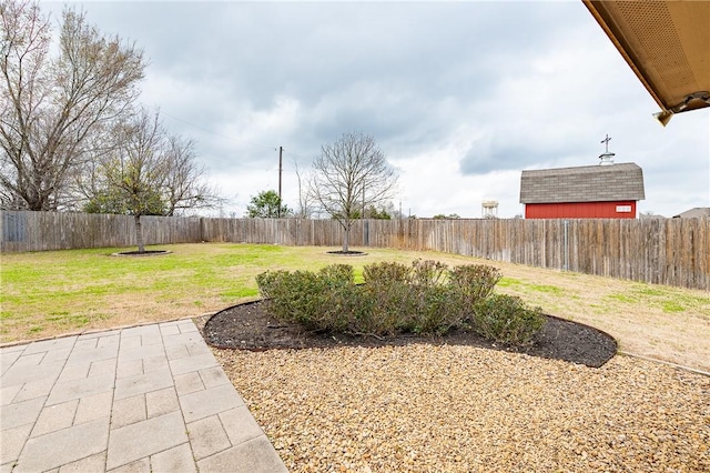 view of yard featuring a fenced backyard and a patio