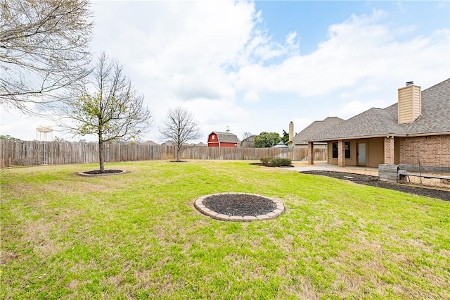 view of yard with a patio area and a fenced backyard