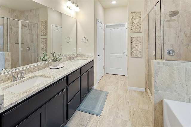 bathroom featuring vanity and separate shower and tub