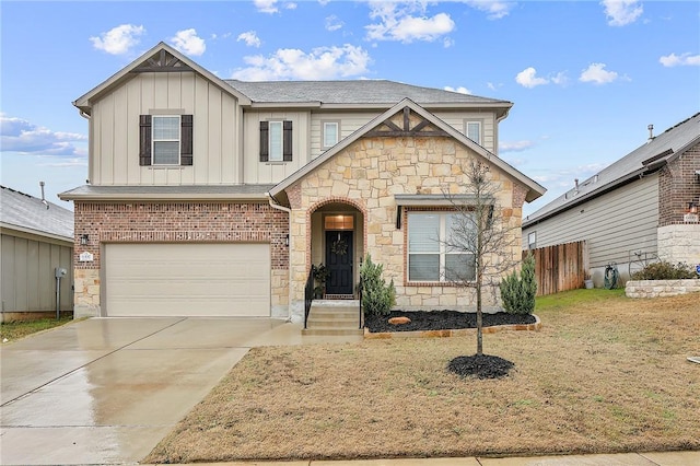 view of front of house featuring a garage and a front yard