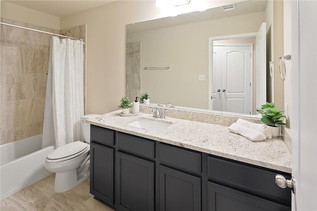 full bathroom featuring vanity, shower / bath combination with curtain, and toilet