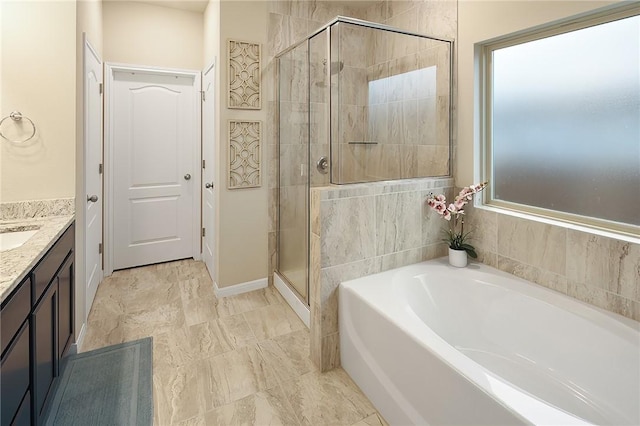 bathroom featuring vanity and plus walk in shower