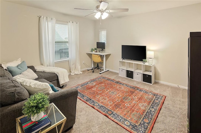 living room featuring ceiling fan and carpet floors