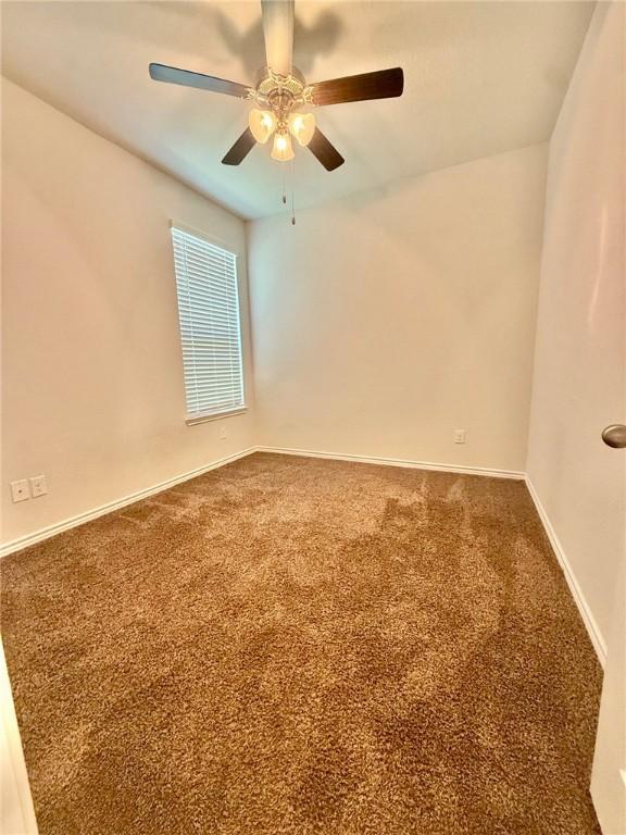1074 Toledo Bend Dr, College Station, TX 77845 - empty room with carpet and a ceiling fan