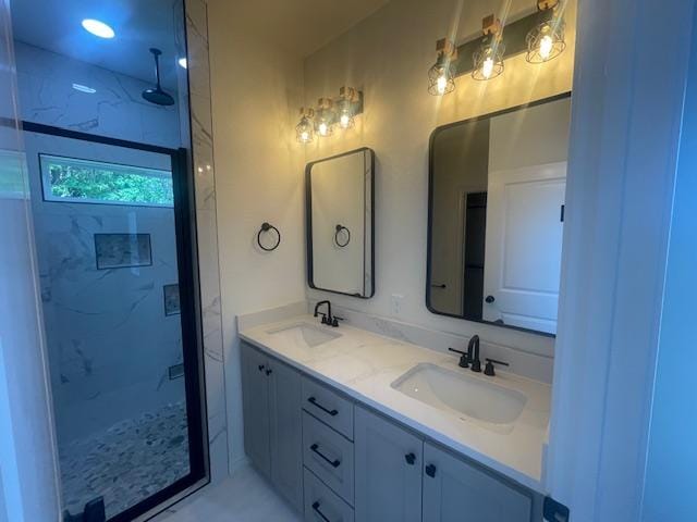 2303 White Wing Dr, Navasota, TX 77868 - full bathroom featuring double vanity and a walk in shower