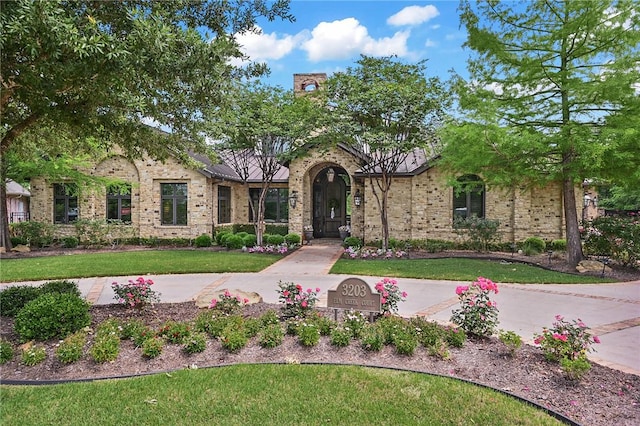 view of front of home with a front yard