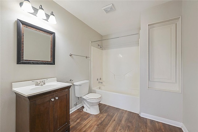 full bathroom featuring wood-type flooring, vanity, toilet, and shower / washtub combination