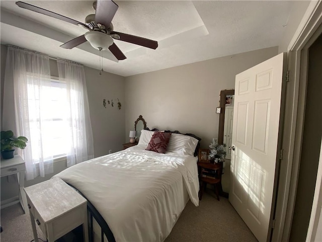 bedroom with carpet and ceiling fan