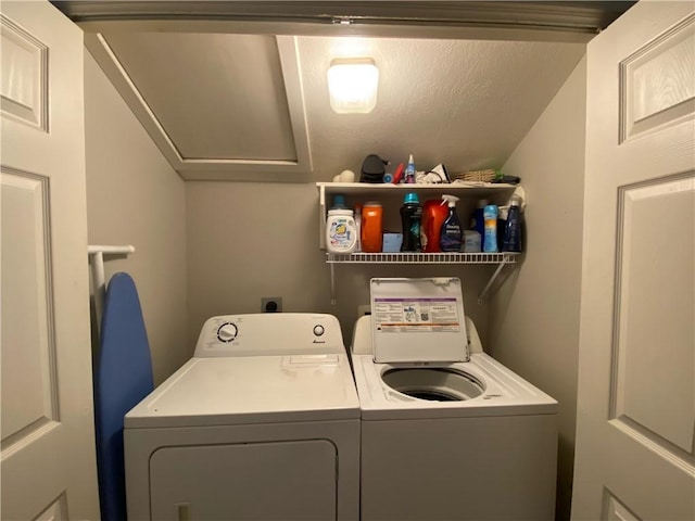 laundry area with independent washer and dryer