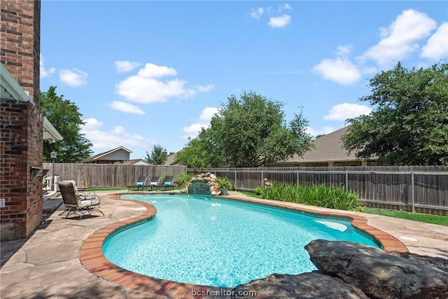 view of pool with a patio