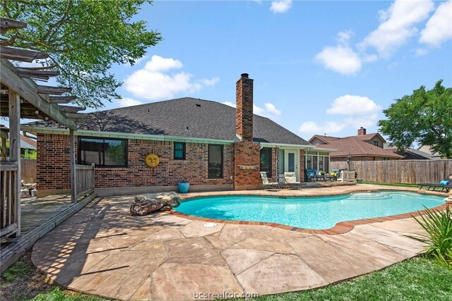 view of pool with a patio area