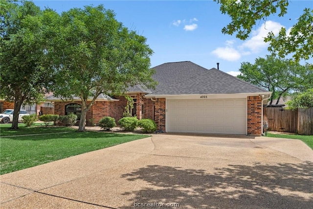 ranch-style home with a garage and a front lawn